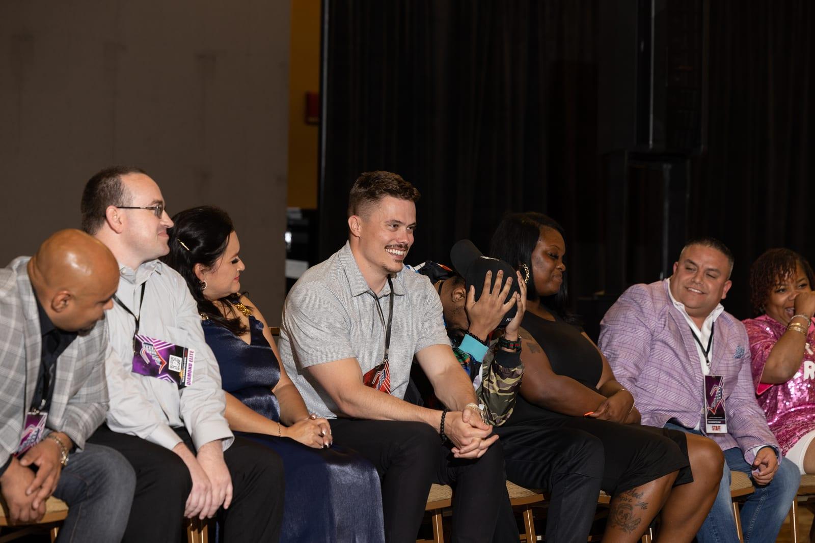 Maverick room — audience laughing on stage
